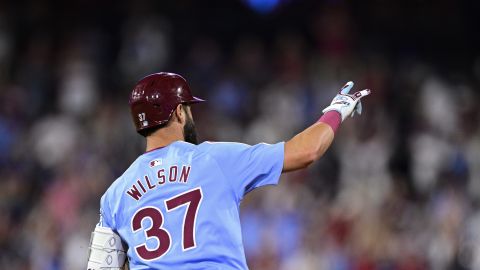 Philadelphia Phillies' Weston Wilson gestures after hitting a solo home run off Washington Nationals' Tanner Rainey during the seventh inning of a baseball game, Thursday, Aug. 15, 2024, in Philadelphia. (AP Photo/Derik Hamilton)