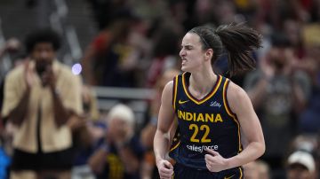 Indiana Fever's Caitlin Clark reacts during the second half of a WNBA basketball game against the Seattle Storm, Sunday, Aug. 18, 2024, in Indianapolis. (AP Photo/Darron Cummings)