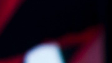 In this Oct. 7, 2012 photo, fans of the soccer team Xoloitzcuintles of Tijuana, or Xolos, cheer for their team at Caliente stadium as they play Toluca in Tijuana, Mexico. The Xolos soccer team has become a sensation in Tijuana since they joined Mexico's first division soccer league in 2011. (AP Photo/Alex Cossio)