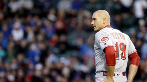 Cincinnati Reds' Joey Votto looks around as he walks on the field during the first inning of a baseball game against the Chicago Cubs Thursday, April 14, 2016, in Chicago. (AP Photo/Nam Y. Huh)