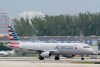 FILE - An American Airlines Airbus A321-231 taxies to the gate, Tuesday, Oct. 20, 2020, at Fort Lauderdale-Hollywood International Airport in Fort Lauderdale, Fla. Airbus has reported record net income of $4.8 billion last year as the aircraft maker delivered more planes to an economy rebounding from the coronavirus pandemic. The Toulouse, France-based company said Thursday, Feb. 17, 2022, that it delivered 611 commercial aircraft in 2021, up from 566 the year before. (AP Photo/Wilfredo Lee, File)