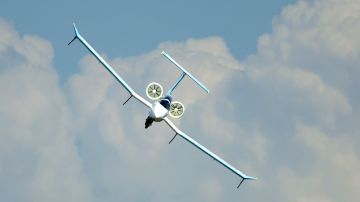 An Airbus Group E-Fan electric aircraft flies during the ILA Berlin Air Show in Berlin, Germany, Tuesday, May 20, 2014. The Berlin Air Show takes place from May 20 until May 25, 2014 . (AP Photo/Michael Sohn)