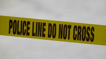 Police tape cordons off the scene of a fatal shooting at Delaware County Linen in Chester, Pa., Wednesday, May 22, 2024. Authorities say a former employee armed with a handgun opened fire at a linen company in a Philadelphia suburb, killing multiple people and wounding three others. (AP Photo/Matt Rourke)