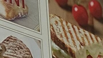 Alicia Acevedo, encargada del restaurante Flor de Lina Farms atiende a un oficial.