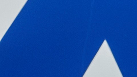 Los Angeles Mayor Karen Bass holds the official Olympic flag returning to Los Angeles at Los Angeles International Airport on Monday, Aug. 12, 2024. (AP Photo/Damian Dovarganes)