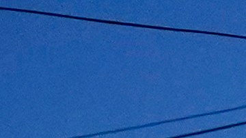 Police tape surrounds the scene after a second shooting Friday, April 22, 2022, injured three people in northwest Washington, a short distance away from another shooting that occurred earlier in the afternoon. (AP Photo/Jacquelyn Martin)