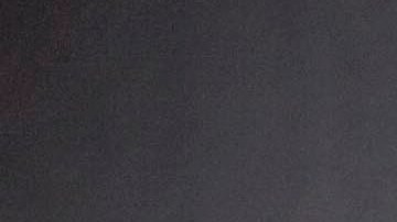 FILE - In this March 3, 2011 file photo, a guard looks on, at right, as prisoners move through the state prison in Jackson, Ga. After years of middling progress, Georgia lawmakers could soon adopt reforms to overhaul the state's clogged, and expensive, prison system. (AP Photo/David Goldman, File)