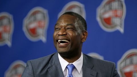 FILE - Former NBA basketball player Dikembe Mutombo laughs during a news conference announcing him as one of the 12 finalists of this year's hall of fame class during an event ahead of the NBA All Star basketball game, on Feb. 14, 2015, in New York. Mutombo is undergoing treatment in Atlanta for a brain tumor, the NBA announced Saturday, OCt. 15, 2022, (AP Photo/Julio Cortez)