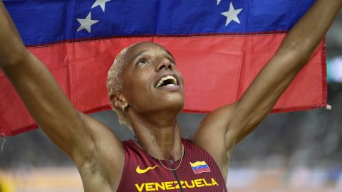 Yulimar Rojas, of Venezuela, celebrates after winning the gold medal in the Women's triple jump final during the World Athletics Championships in Budapest, Hungary, Friday, Aug. 25, 2023. (AP Photo/Matthias Schrader)