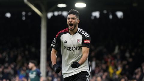 Fulham's Raul Jimenez celebrates after scoring his side's first goal during the English Premier League soccer match between Arsenal and Fulham at Craven Cottage stadium in London, Sunday, Dec. 31, 2023. (AP Photo/Alastair Grant)
