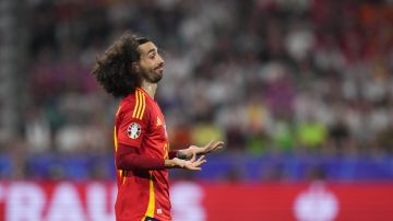 Spain's Marc Cucurella gestures during a semifinal match between Spain and France at the Euro 2024 soccer tournament in Munich, Germany, Tuesday, July 9, 2024. (AP Photo/Manu Fernandez)