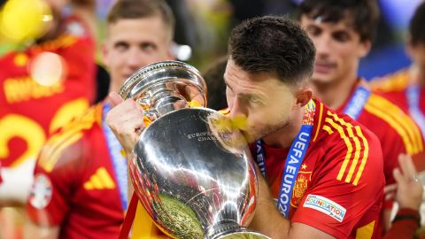 Spain's Aymeric Laporte kisses the trophy after winning the final match between Spain and England at the Euro 2024 soccer tournament in Berlin, Germany, Sunday, July 14, 2024. Spain won 2-1. (AP Photo/Manu Fernandez)