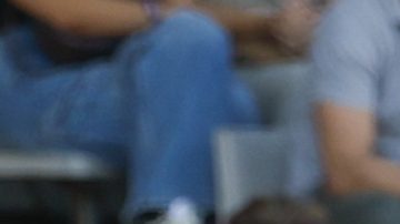 Barcelona's head coach Hansi Flick, left, gives instructions next to Pau Cubarsi during the Spanish La Liga soccer match between FC Barcelona and Valladolid at the Olympic stadium in Barcelona, Spain, Saturday, Aug. 31, 2024. (AP Photo/Joan Monfort)