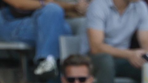 Barcelona's head coach Hansi Flick, left, gives instructions next to Pau Cubarsi during the Spanish La Liga soccer match between FC Barcelona and Valladolid at the Olympic stadium in Barcelona, Spain, Saturday, Aug. 31, 2024. (AP Photo/Joan Monfort)
