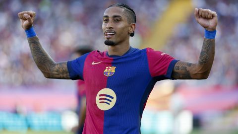 Barcelona's Raphinha celebrates scoring his side's 4th goal during the Spanish La Liga soccer match between FC Barcelona and Valladolid at the Olympic stadium in Barcelona, Spain, Saturday, Aug. 31, 2024. (AP Photo/Joan Monfort)