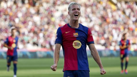 Barcelona's Dani Olmo celebrates scoring his side's 6th goal during the Spanish La Liga soccer match between FC Barcelona and Valladolid at the Olympic stadium in Barcelona, Spain, Saturday, Aug. 31, 2024. (AP Photo/Joan Monfort)