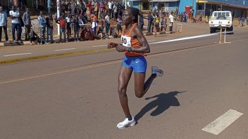 FILE -Rebecca Cheptegei, competes at the Discovery 10km road race in Kapchorwa, Uganda, Jan. 20, 2023. (AP Photo, File)