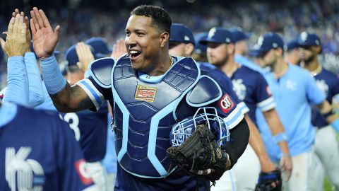 Kansas City Royals catcher Salvador Perez celebrates with teammates after their baseball game against the Minnesota Twins, Friday, Sept. 6, 2024, in Kansas City, Mo. The Royals won 5-0. (AP Photo/Charlie Riedel)