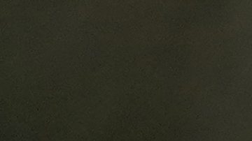 RB driver Daniel Ricciardo of Australia smiles in the paddock at the Baku circuit, in Baku, Azerbaijan, Thursday, Sept.12, 2024. The Formula One Grand Prix will be held on Sunday. (AP Photo/Sergei Grits)