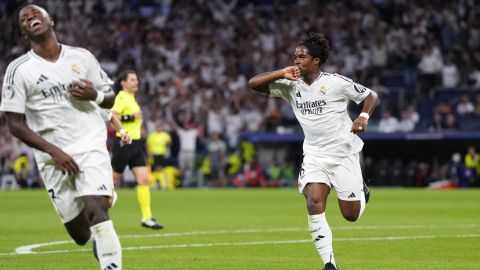 Real Madrid's Endrick celebrates after scoring his side's third goal during the Champions League opening phase soccer match between Real Madrid and VfB Stuttgart at the Santiago Bernabeu stadium, in Madrid, Tuesday, Sept. 17, 2024. Real Madrid won 3-1. (AP Photo/Manu Fernandez)