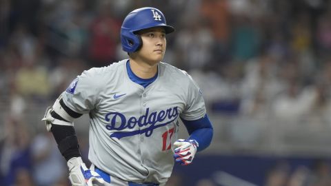 Los Angeles Dodgers' Shohei Ohtani (17) runs the bases after hitting a two-run home run during the third inning of a baseball game against the Miami Marlins, Tuesday, Sept. 17, 2024, in Miami. (AP Photo/Marta Lavandier)