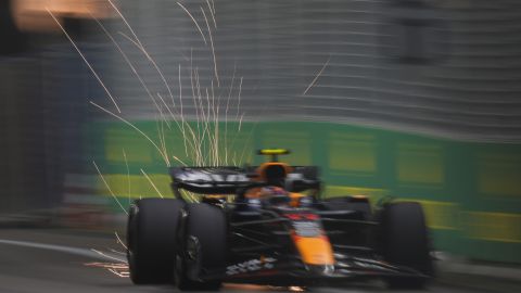 Red Bull driver Sergio Perez of Mexico steers his car during the qualifying session of the Singapore Formula One Grand Prix at the Marina Bay Street Circuit, in Singapore, Saturday, Sept. 21, 2024. (AP Photo/Vincent Thian)