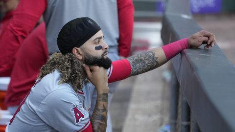 Los Angeles Angels' Jack López looks out from the dugout after his team's loss to the Chicago White Sox, setting a new franchise season record of 96 loses, in a baseball game Thursday, Sept. 26, 2024, in Chicago. (AP Photo/Charles Rex Arbogast)