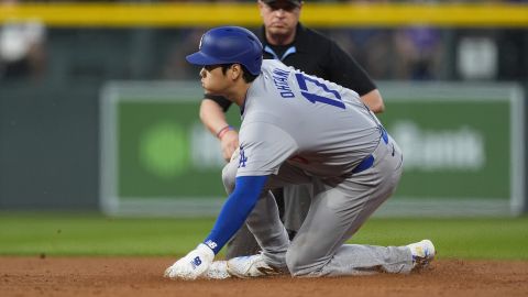 Los Angeles Dodgers' Shohei Ohtani steals second base in the second inning of a baseball game against the Colorado Rockies, Friday, Sept. 27, 2024, in Denver. (AP Photo/David Zalubowski)