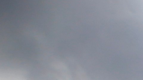 Clouds are reflected on Anish Kapoor's "Sky Mirror", an art piece that sits placed over a reflecting pool on the east plaza of AT&T Stadium, home of the Dallas Cowboys , Friday, Oct. 11, 2013, in Arlington, Texas. The concave disc covered in polished steel had temporary homes in New York, London and Sydney before getting a permanent spot in a black granite fountain outside the huge sliding glass doors on the east side of the stadium. (AP Photo/Tony Gutierrez)