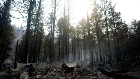 A fire-ravaged property is seen after the Bridge Fire swept through Thursday, Sept. 12, 2024, in Wrightwood, Calif. (AP Photo/Eric Thayer)
