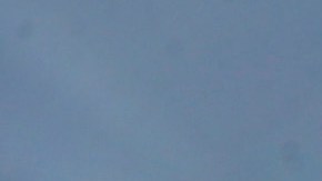 Michelle Dyer is silhouetted as she sells ice cold drinks along Ashland Avenue on Chicago's Southside as temperatures climb into the high 90's with the heat index breaking 100, Friday, July 19, 2013, in Chicago. (AP Photo/Charles Rex Arbogast)