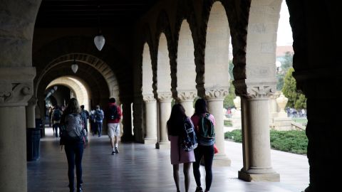 Students walk on campus at Stanford University Wednesday, Jan. 13, 2016, in Stanford, Calif. (AP Photo/Marcio Jose Sanchez)