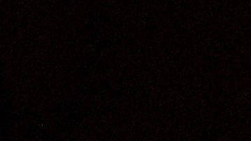 A man watches flames from the Airport Fire as it envelops a hill behind homes Monday, Sept. 9, 2024, in Trabuco Canyon, Calif. (AP Photo/Gregory Bull)