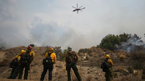 Fire crews monitor the Line Fire Saturday, Sept. 7, 2024, in Highland, Calif. (AP Photo/Eric Thayer)