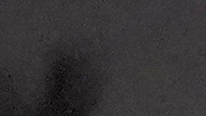 FILE - In this March 21, 2021, file photo a 7-year-old migrant girl from Honduras, left, walks with Fernanda Solis, 25, center, also of Honduras, and an unidentified man as they approach a U.S. Customs and Border Protection processing center to turn themselves in while seeking asylum moments after crossing the U.S.-Mexico border in Mission, Texas. The girl's journey illustrates the extraordinary risks taken by parents to get their children across the border, even if it means abandoning them for the most perilous part of the trip. She is one of thousands of kids arriving alone in the U.S. in a surge that is straining the federal government's system for managing refugees. (AP Photo/Julio Cortez)