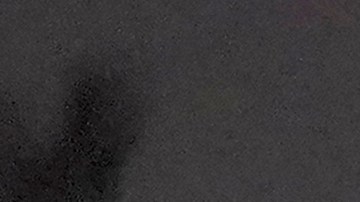 FILE - In this March 21, 2021, file photo a 7-year-old migrant girl from Honduras, left, walks with Fernanda Solis, 25, center, also of Honduras, and an unidentified man as they approach a U.S. Customs and Border Protection processing center to turn themselves in while seeking asylum moments after crossing the U.S.-Mexico border in Mission, Texas. The girl's journey illustrates the extraordinary risks taken by parents to get their children across the border, even if it means abandoning them for the most perilous part of the trip. She is one of thousands of kids arriving alone in the U.S. in a surge that is straining the federal government's system for managing refugees. (AP Photo/Julio Cortez)