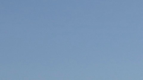 California Highway Patrol officer, Matthew Musselmann stops a motorist on Interstate 5 freeway who is suspected of speeding on Interstate 5 freeway for speeding Thursday, April 23, 2020, in Anaheim, Calif. The CHP is issuing a lot more tickets to motorists where lanes are wide open during the coronavirus pandemic. From March 19, when the stay-at-home order began, through April 19, officers issued 87% more citations to drivers suspected of speeding in excess of 100 mph. That's compared to the same period last year. The jump in speeding tickets coincides with a 35% decline in traffic volume. (AP Photo/Chris Carlson)