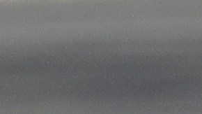 A shopper leaves a supermarket with goods in plastic bags in Christchurch, New Zealand, Friday, Aug. 10, 2018. New Zealand plans to ban disposable plastic shopping bags by next July as the nation tries to live up to its clean-and-green image. Prime Minister Jacinda Ardern said Friday that New Zealanders use hundreds of millions of the bags each year and that some of them end up polluting the precious coastal and marine environment. (AP Photo/Mark Baker)