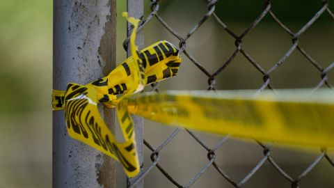 Police tape cordons off the scene of a fatal shooting at Delaware County Linen in Chester, Pa., Wednesday, May 22, 2024. Authorities say a former employee armed with a handgun opened fire at a linen company in a Philadelphia suburb, killing multiple people and wounding three others. (AP Photo/Matt Rourke)