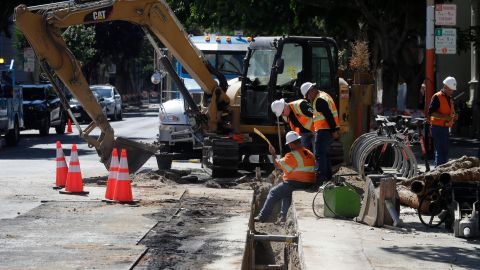A Pacific Gas & Electric crew works in San Francisco, Thursday, Aug. 15, 2019. (AP Photo/Jeff Chiu)