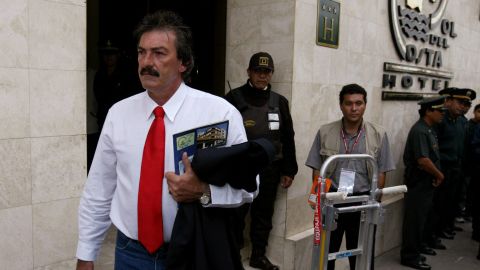 Mexico's coach Ricardo Lavolpe leaves a hotel in Piura, in northern Peru, on route to the local airport, Monday, July 19, 2004. Mexico lost 4-0 to Brazil Sunday and was eliminated from the Copa America. (AP Photo/Ricardo Mazalan)