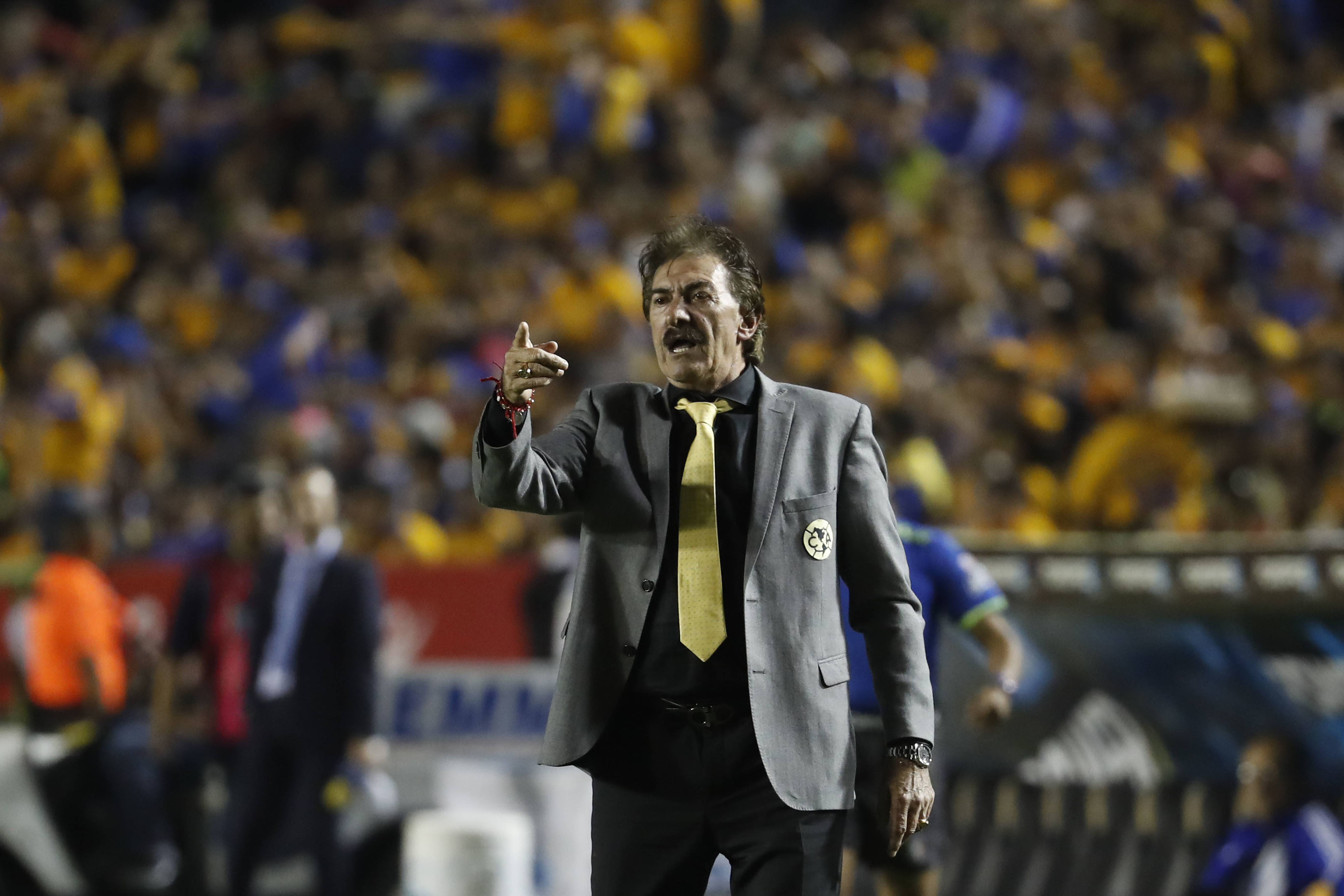 America coach Ricardo La Volpe gives instructions to his players from the sideline during the Mexican soccer league final match against Tigres in Monterrey, Mexico, Sunday, Dec. 25, 2016. (AP Photo/Eduardo Verdugo)