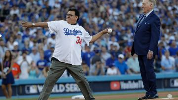 Vin Scully and Fernando Valenzuela throw out the ceremonial first pitch before Game 2 of baseball's World Series between the Houston Astros and the Los Angeles Dodgers Wednesday, Oct. 25, 2017, in Los Angeles. (AP Photo/David J. Phillip)