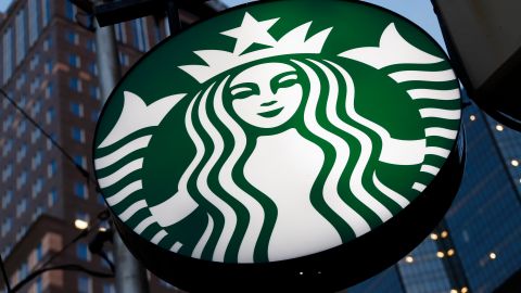 FILE - This June 26, 2019 file photo shows a Starbucks sign outside a Starbucks coffee shop in downtown Pittsburgh. Starbucks Corp. reports financial earns on Wednesday, Oct. 30. (AP Photo/Gene J. Puskar, File)