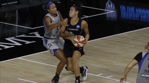 New York Liberty guard Kia Nurse (5) drives around Minnesota Lynx forward Napheesa Collier (24) during the first half of a WNBA basketball game Wednesday, Aug. 5, 2020, in Bradenton, Fla. (AP Photo/Chris O'Meara)