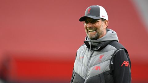 Liverpool's manager Jurgen Klopp looks on during warm up before the English Premier League soccer match between Manchester United and Liverpool, at the Old Trafford stadium in Manchester, England, Thursday, May 13, 2021. (Peter Powell/Pool via AP)