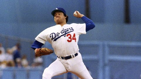 FILE - Los Angeles Dodgers pitcher Fernando Valenzuela prepares to release the ball in the first inning of the opening game of the National League Championship series against the St. Louis Cardinals, Oct. 9, 1985, in Los Angeles. The Dodgers will retire the No. 34 jersey of Valenzuela during a three-day celebration this summer. (AP Photo/Lennox McLendon, File)