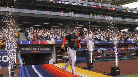 San Francisco Giants J.D. Davis enters the field for a MLB baseball game against the San Diego Padres at the Alfredo Harp Helu Stadium in Mexico City, Saturday, April 29, 2023. (AP Photo/Fernando Llano)