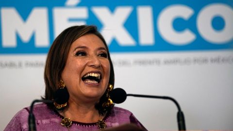 FILE - Senator Xochitl Galvez, an opposition presidential hopeful, speaks to the press after registering her name as a candidate in Mexico City, July 4, 2023. The street saleswoman turned tech entrepreneur is shaking up the contest to succeed Mexico's popular president, offering an alternative to Mexican President Andrés Manuel López Obrador’s dominant party. (AP Photo/Fernando Llano, File)