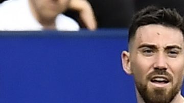 Real Madrid's David Alaba is fouled by Osasuna's Lucas Torrom during the Spanish La Liga soccer match between Osasuna and Real Madrid at the El Sadar stadium in Pamplona, Spain, Saturday, March 16, 2023. (AP Photo/Alvaro Barrientos)